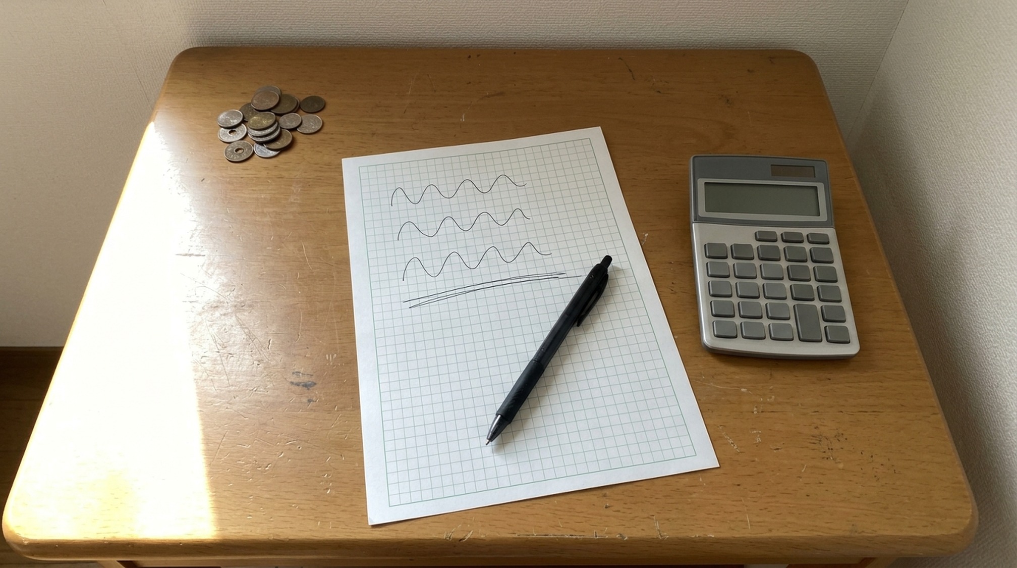 ワクワクメールの評判にあったポイント消費を書き出して計算した机の上